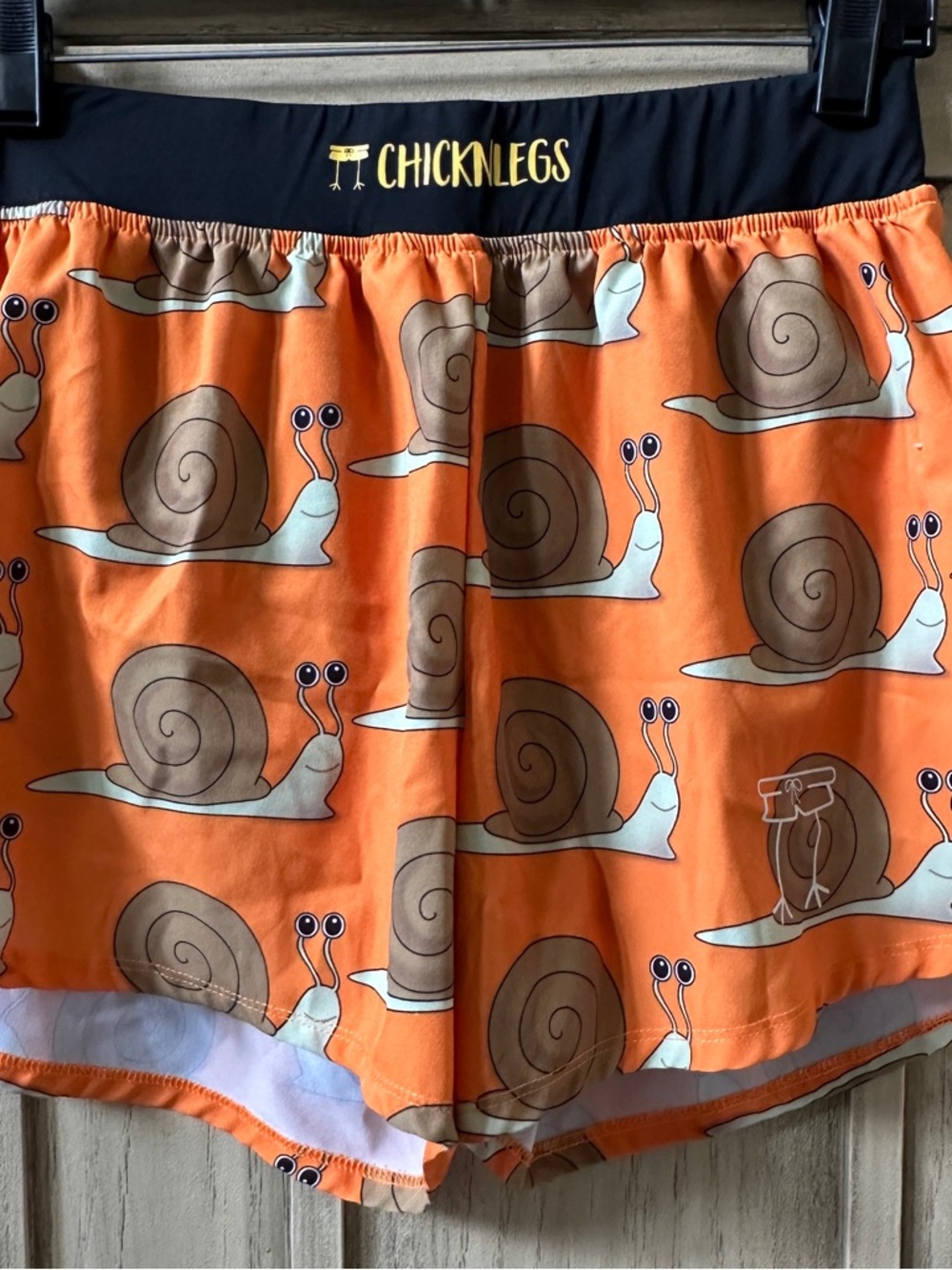 ChicknLegs Men's Orange Snail Print Athletic Shorts 3” Inseam Small S unisex